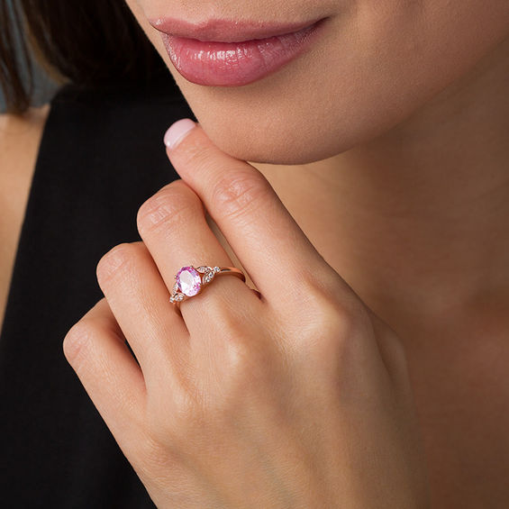 Oval Lab-Created Pink Sapphire and 1/10 CT. T.w. Diamond Leaf Sides Ring in 10K Rose Gold