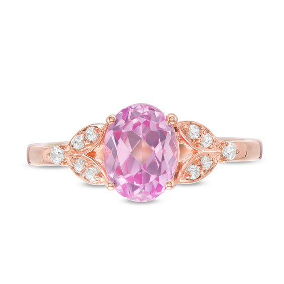 Oval Lab-Created Pink Sapphire and 1/10 CT. T.w. Diamond Leaf Sides Ring in 10K Rose Gold