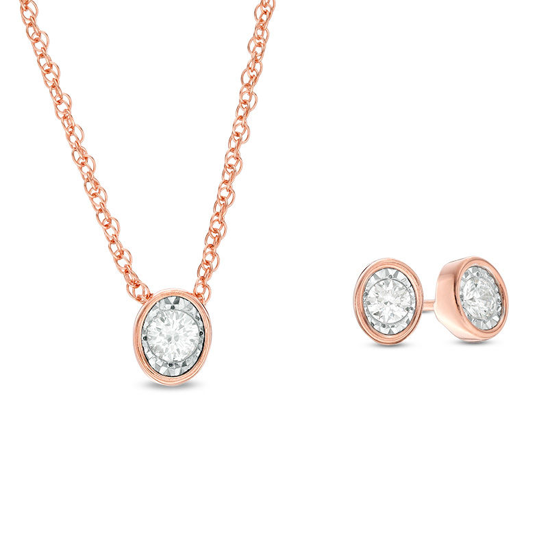 1/3 CT. T.W. Diamond Solitaire Oval-Shaped Pendant and Stud Earrings ...