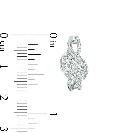 1/5 CT. T.w. Diamond Three Stone Bypass Ribbon Drop Earrings in Sterling Silver