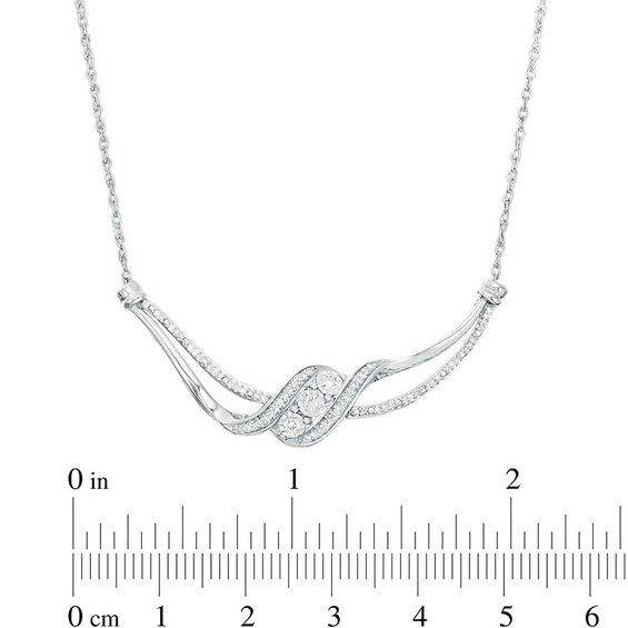1/5 CT. T.w. Diamond Three Stone Bypass Ribbon Necklace in Sterling Silver