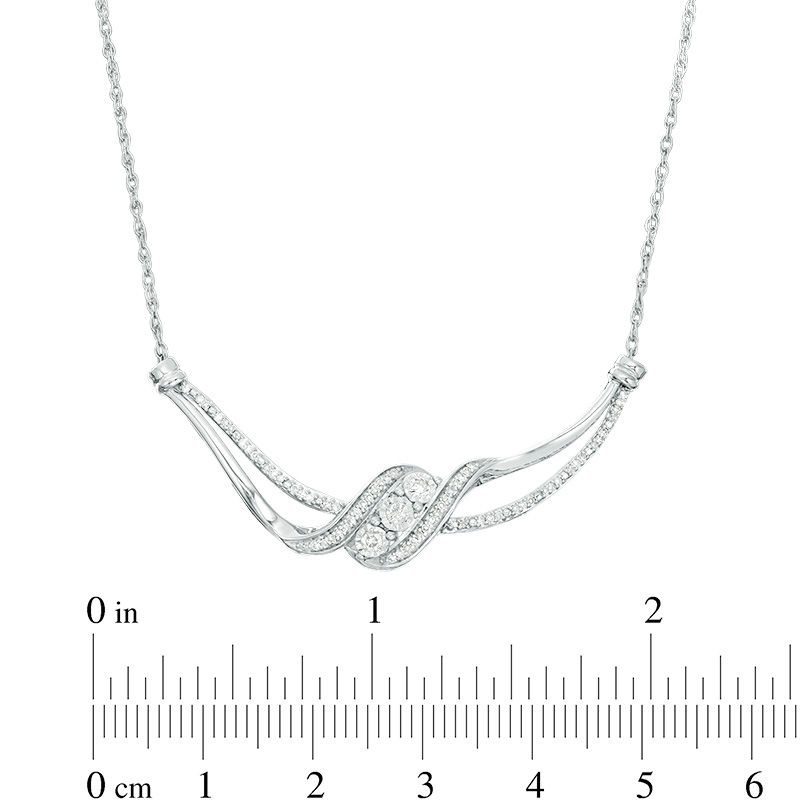 Main Image 2 of 1/5 CT. T.W. Diamond Three Stone Bypass Ribbon Necklace in Sterling Silver