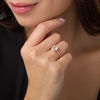 Thumbnail Image 2 of Oval Lab-Created White Sapphire and 1/20 CT. T.W. Diamond Ring in 10K Rose Gold - Size 7