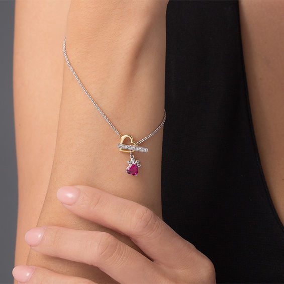 6.0mm Heart-Shaped Lab-Created Ruby and White Sapphire Paw Print Toggle Bracelet in Sterling Silver and 10K Gold - 7.25" 6.0mm Heart-Shaped Lab-Created Ruby and White Sapphire Paw Print Toggle Bracelet in Sterling Silver and 10K Gold - 7.25"