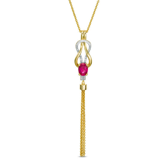 Oval Lab-Created Ruby and 1/20 CT. T.W. Diamond Double Loop Knot Tassel Pendant in Sterling Silver with 14K Gold Plate Oval Lab-Created Ruby and 1/20 CT. T.W. Diamond Double Loop Knot Tassel Pendant in Sterling Silver with 14K Gold Plate