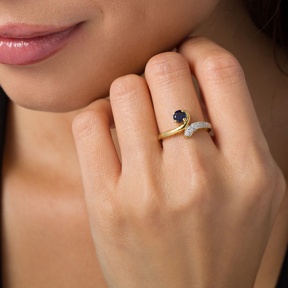 5.0mm Lab-Created Blue Sapphire and 1/10 CT. T.w. Diamond Bypass Ring in Sterling Silver with 14K Gold Plate