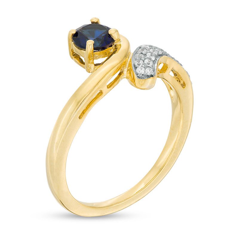 5.0mm Lab-Created Blue Sapphire and 1/10 CT. T.W. Diamond Bypass Ring in Sterling Silver with 14K Gold Plate