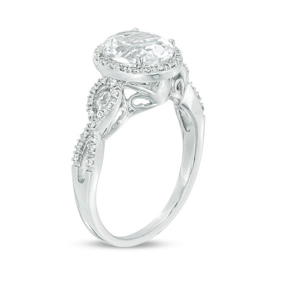 Oval Lab-Created White Sapphire and 1/6 CT. T.w. Diamond Frame Infinity Shank Engagement Ring in Sterling Silver