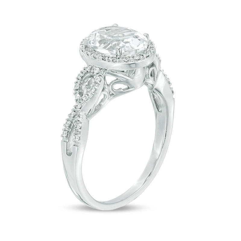Oval Lab-Created White Sapphire and 1/6 CT. T.W. Diamond Frame Infinity Shank Engagement Ring in Sterling Silver
