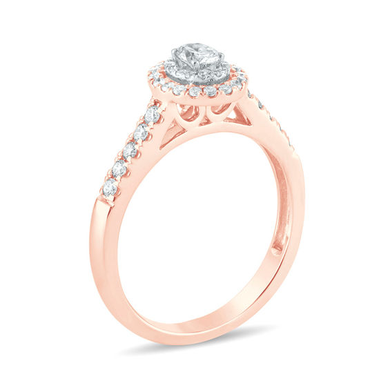 1/2 CT. T.w. Oval Diamond Double Frame Engagement Ring in 14K Rose Gold
