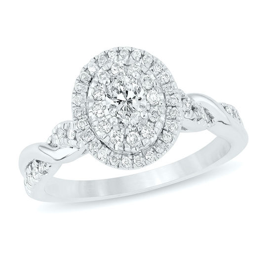 1/2 CT. T.W. Oval Diamond Double Frame Twist Engagement Ring in 14K