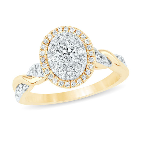 1/2 CT. T.w. Oval Diamond Double Frame Twist Engagement Ring in 14K Gold