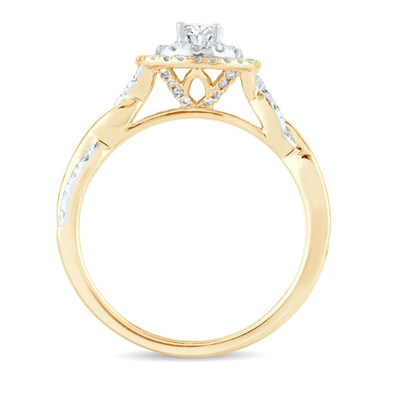 1/2 CT. T.w. Oval Diamond Double Frame Twist Engagement Ring in 14K Gold