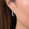 Thumbnail Image 2 of Oval Swiss Blue Topaz and Lab-Created White Sapphire Hoop Earrings in Sterling Silver