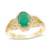 Thumbnail Image 1 of Oval Emerald and 1/5 CT. T.W. Diamond Frame Scrolling Split Shank Ring in 10K Gold