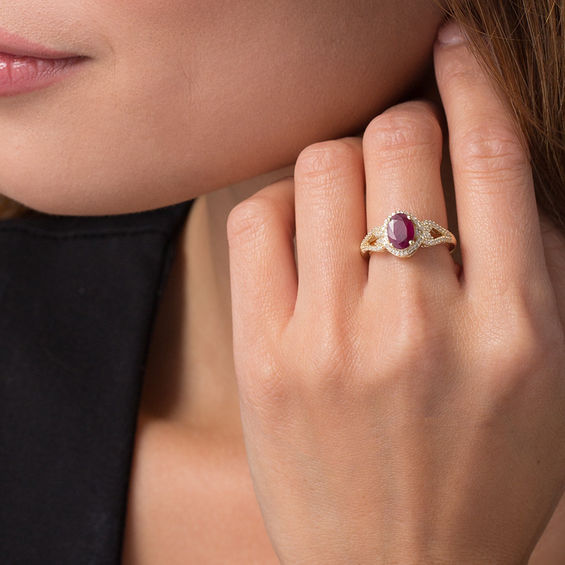 Oval Ruby and 1/5 CT. T.w. Diamond Frame Scrolling Split Shank Ring in 10K Gold