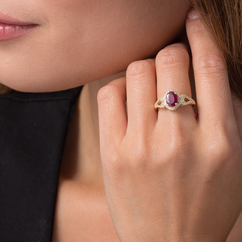 Main Image 2 of Oval Ruby and 1/5 CT. T.W. Diamond Frame Scrolling Split Shank Ring in 10K Gold