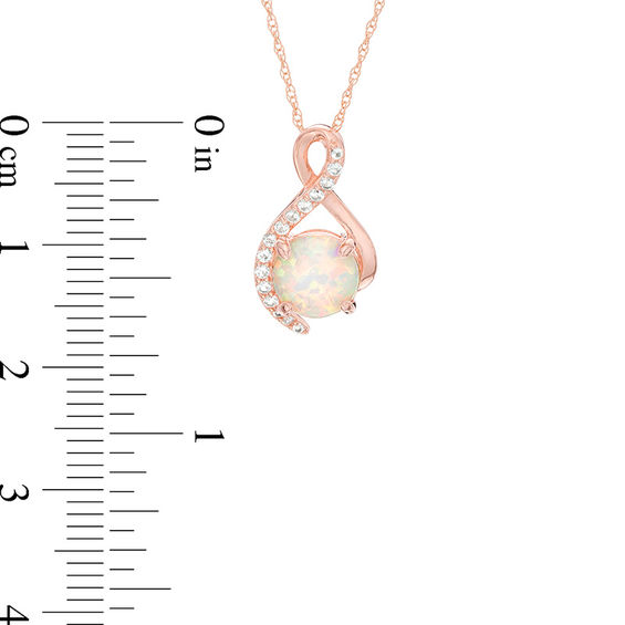 Lab-Created Opal and White Sapphire Ribbon Pendant and Stud Earrings Set in Sterling Silver with 14K Rose Gold Plate Lab-Created Opal and White Sapphire Ribbon Pendant and Stud Earrings Set in Sterling Silver with 14K Rose Gold Plate