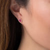 Thumbnail Image 2 of Pear-Shaped Ruby and 1/8 CT. T.W. Diamond Frame Stud Earrings in 10K Rose Gold