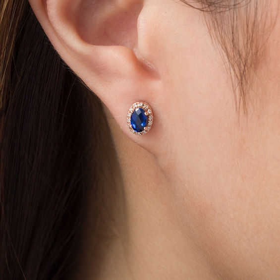 Checkerboard Oval Lab-Created Blue Sapphire and 1/15 CT. T.W. Diamond Frame Stud Earrings in 10K Two-Tone Gold Checkerboard Oval Lab-Created Blue Sapphire and 1/15 CT. T.W. Diamond Frame Stud Earrings in 10K Two-Tone Gold
