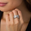 Thumbnail Image 1 of 2 CT. T.W. Baguette and Round Diamond Triple-Row Crossover Ring in 10K White Gold - Size 7