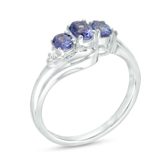 Oval Tanzanite and Diamond Accent Swirl Bypass Pendant and Three Stone Ring Set in Sterling Silver Oval Tanzanite and Diamond Accent Swirl Bypass Pendant and Three Stone Ring Set in Sterling Silver