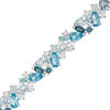 Thumbnail Image 0 of Multi-Shaped Blue and White Topaz Cluster Bracelet in Sterling Silver - 7.5"