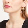 Thumbnail Image 1 of Made in Italy 60.0mm Wavy Hoop Earrings in 14K Gold