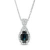 Thumbnail Image 0 of Oval Blue Sapphire and 1/10 CT. T.W. Diamond Frame Twist Drop Pendant in 10K White Gold
