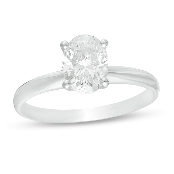 1-1/2 CT. T.w. Certified Oval Diamond Solitaire Engagement Ring in 14K White Gold (I/I2)