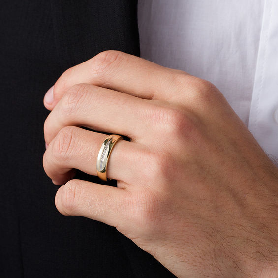 1/20 CT. T.w. Diamond Wedding Band in 10K Gold