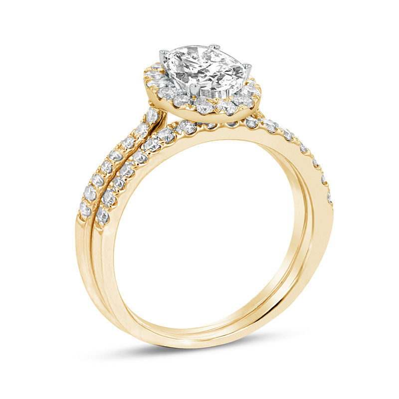 1-1/3 CT. T.W. Oval Diamond Frame Bridal Set in 14K Gold (J/SI2)