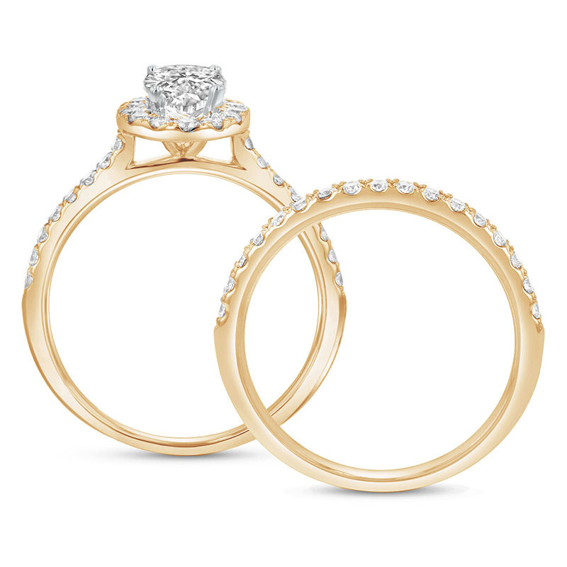 1-1/3 CT. T.W. Oval Diamond Frame Bridal Set in 14K Gold (J/SI2)