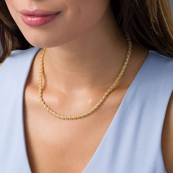1/2 CT. T.W. Diamond "S" Curve Tennis Necklace in Sterling Silver with Yellow Rhodium - 17" 1/2 CT. T.W. Diamond "S" Curve Tennis Necklace in Sterling Silver with Yellow Rhodium - 17"