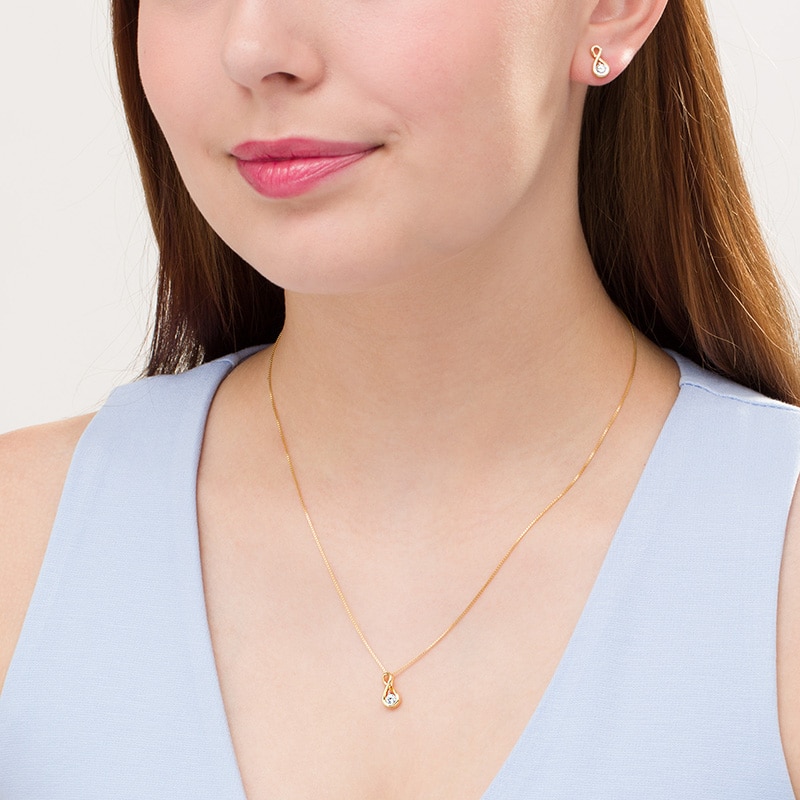 Main Image 2 of 1/2 CT. T.W. Diamond Solitaire Infinity Pendant and Stud Earrings Set in 10K Gold