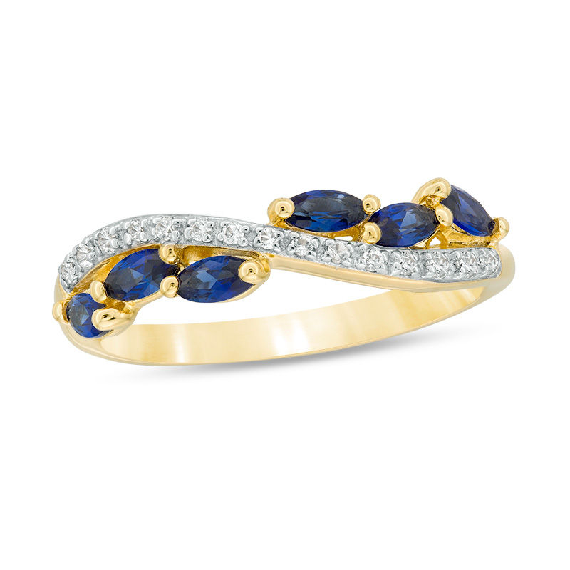 Main Image 1 of Marquise Blue Sapphire and 1/15 CT. T.W. Diamond Swirl Ribbon Ring in 10K Gold