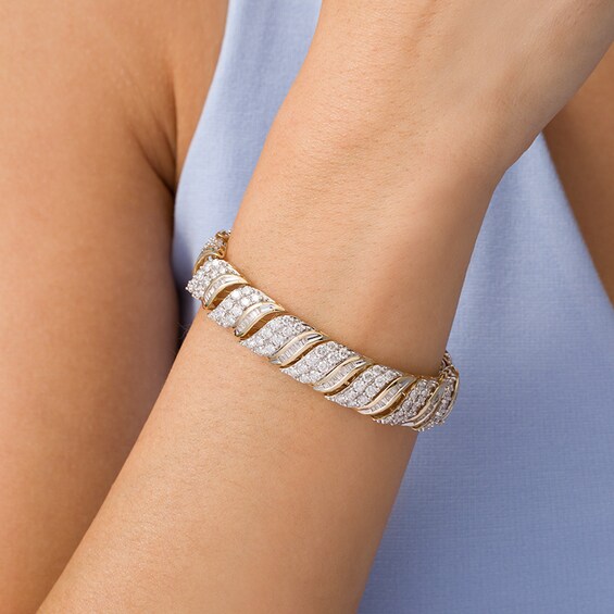 10 CT. T.w. Baguette and Round Diamond Wave Bracelet in 10K Gold