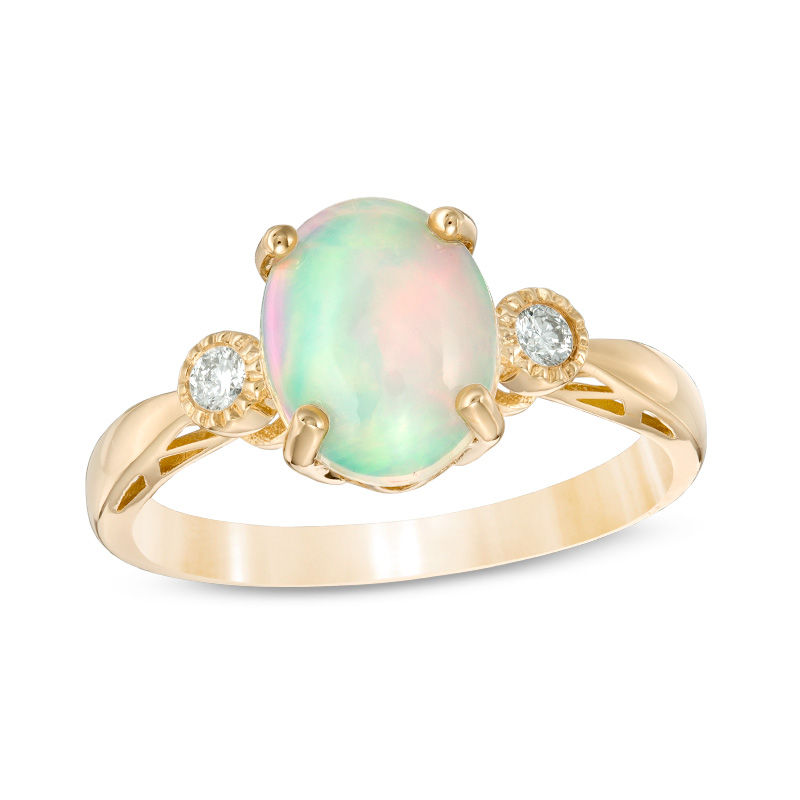 Oval Cabochon Opal and 1/20 CT. T.W. Diamond Ring in 10K Gold | Zales