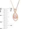 Thumbnail Image 1 of Pear-Shaped Morganite and 1/8 CT. T.W. Diamond Infinity Pendant in 10K Rose Gold