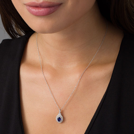 Oval Lab-Created Blue and White Sapphire Double Frame Petal Accent Pendant in Sterling Silver