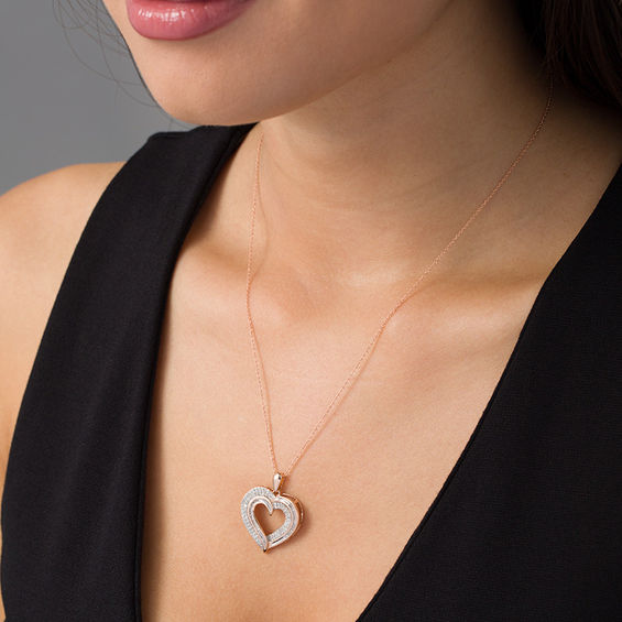 1/2 CT. T.w. Baguette and Round Diamond Heart Pendant in 10K Rose Gold