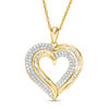 Thumbnail Image 1 of 1/2 CT. T.W. Baguette and Round Diamond Heart Pendant in 10K Gold