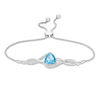 Thumbnail Image 1 of 8.0mm Trillion-Cut Swiss Blue Topaz and Lab-Created White Sapphire Braid Bolo Bracelet in Sterling Silver - 9.5"