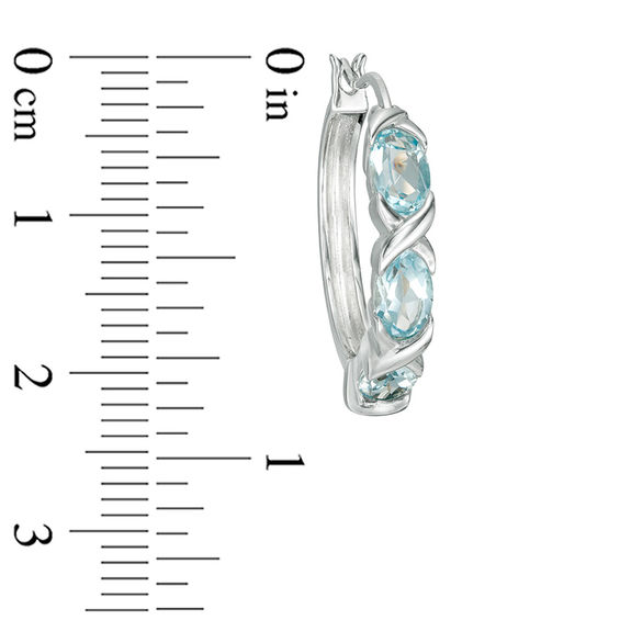 Oval Blue Topaz Three Stone Hoop Earrings in Sterling Silver
