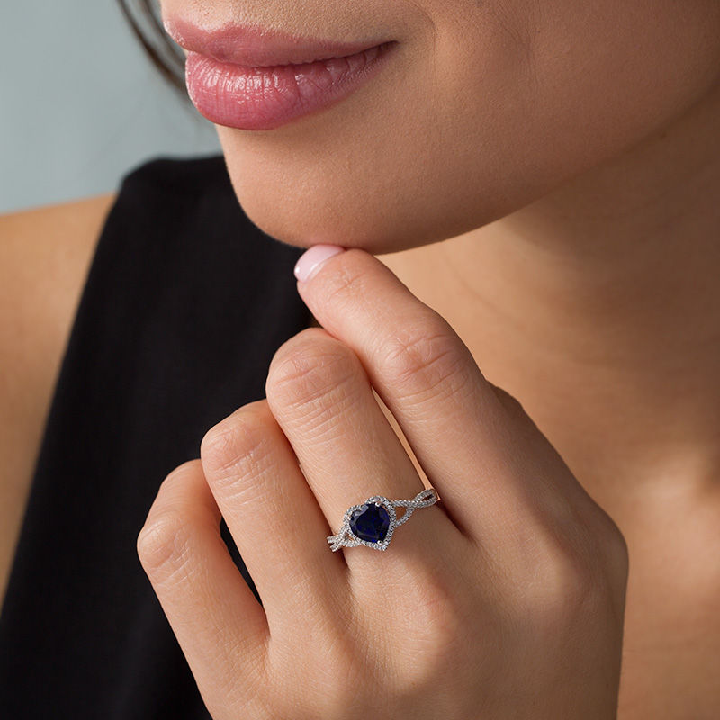 7.0mm Heart-Shaped Lab-Created Blue Sapphire and 1/5 CT. T.W. Diamond Frame Crossover Ring in 10K White Gold