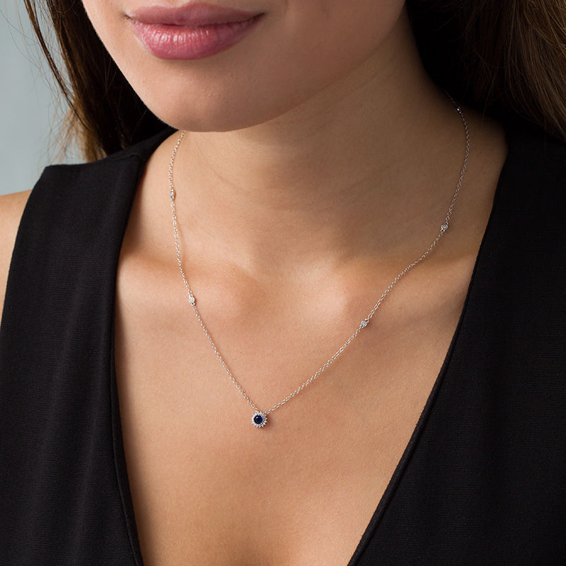 4.0mm Lab-Created Blue Sapphire and 1/15 CT. T.W. Diamond Sunburst Frame and Station Necklace in Sterling Silver