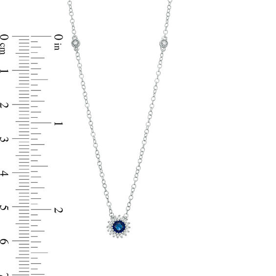 4.0mm Lab-Created Blue Sapphire and 1/15 CT. T.w. Diamond Sunburst Frame and Station Necklace in Sterling Silver