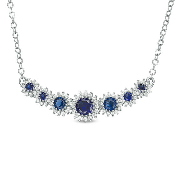 Lab-Created Blue Sapphire and 1/5 CT. T.W. Diamond Seven Stone Sunburst Frame Necklace in Sterling Silver Lab-Created Blue Sapphire and 1/5 CT. T.W. Diamond Seven Stone Sunburst Frame Necklace in Sterling Silver