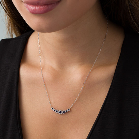 Lab-Created Blue Sapphire and 1/5 CT. T.W. Diamond Seven Stone Sunburst Frame Necklace in Sterling Silver Lab-Created Blue Sapphire and 1/5 CT. T.W. Diamond Seven Stone Sunburst Frame Necklace in Sterling Silver