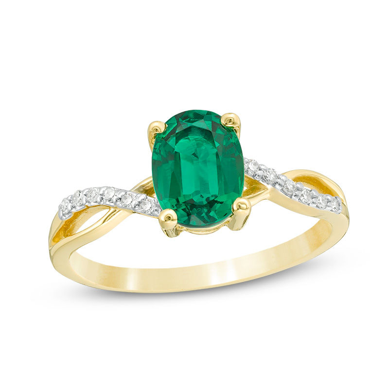 Main Image 1 of Oval Lab-Created Emerald and 1/20 CT. T.W. Diamond Twist Shank Ring in 10K Gold